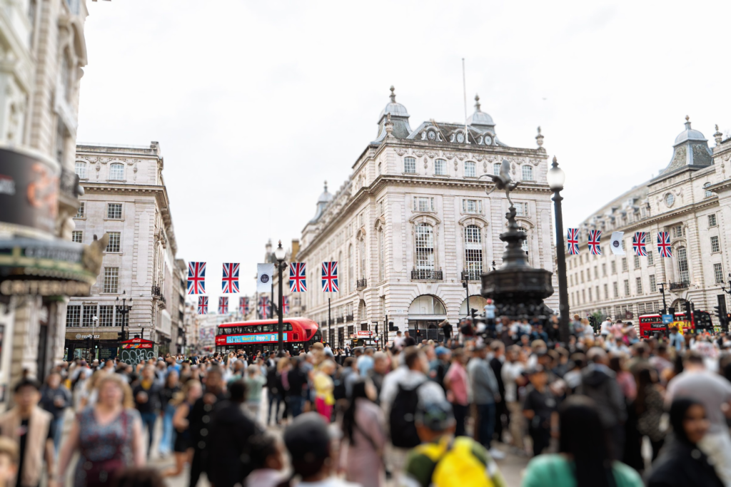 Crowded London street, representing overwhelming must-see travel lists