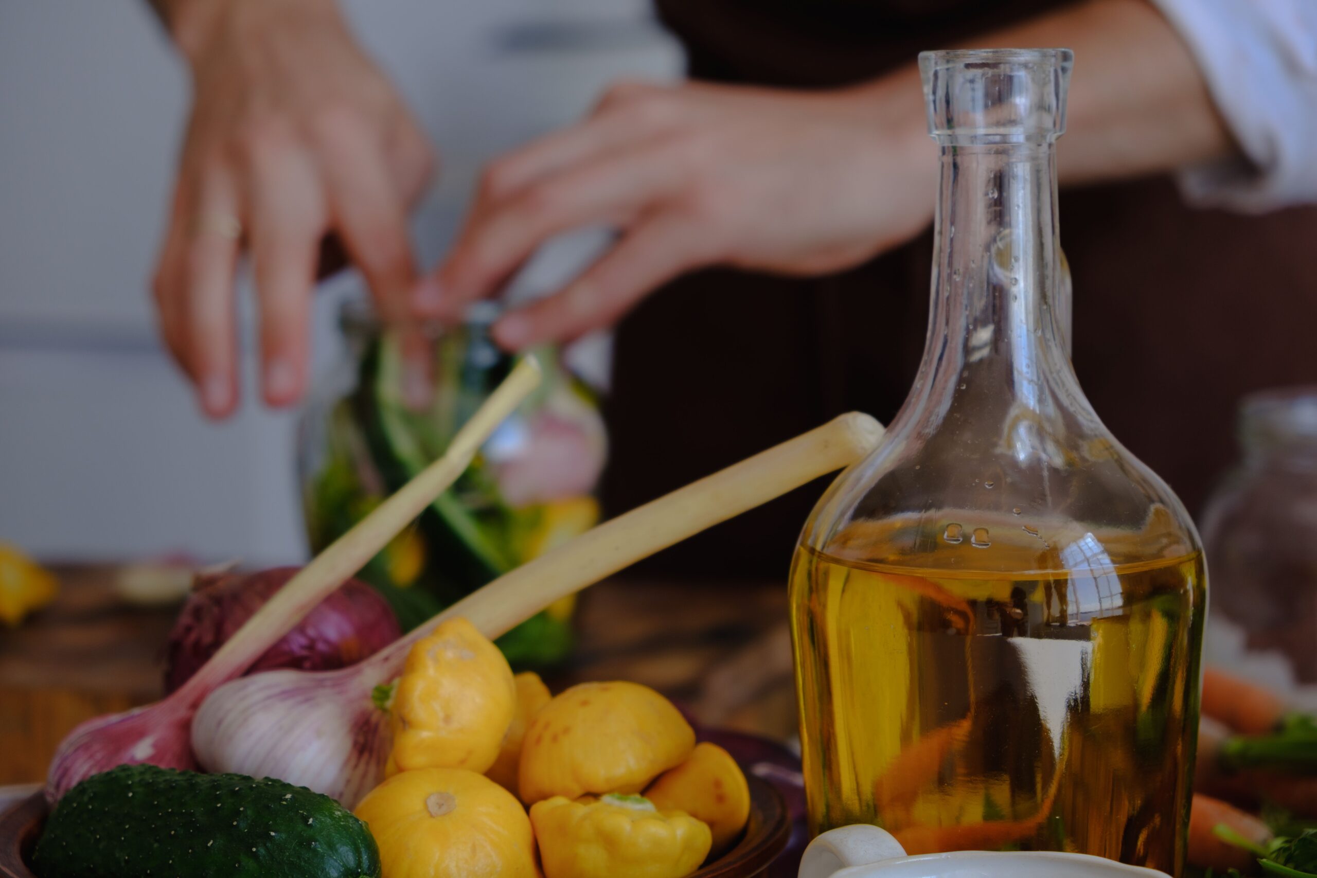 Bulk  buying cooking oil used to refill a smaller everyday kitchen dispenser